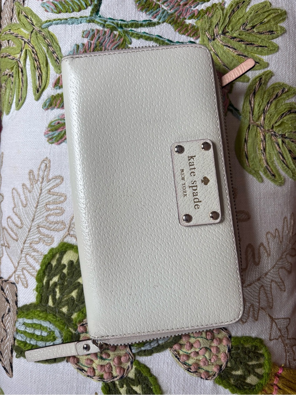 kate spade Cream Zip-Around Wallet with Gold Logo Plate
